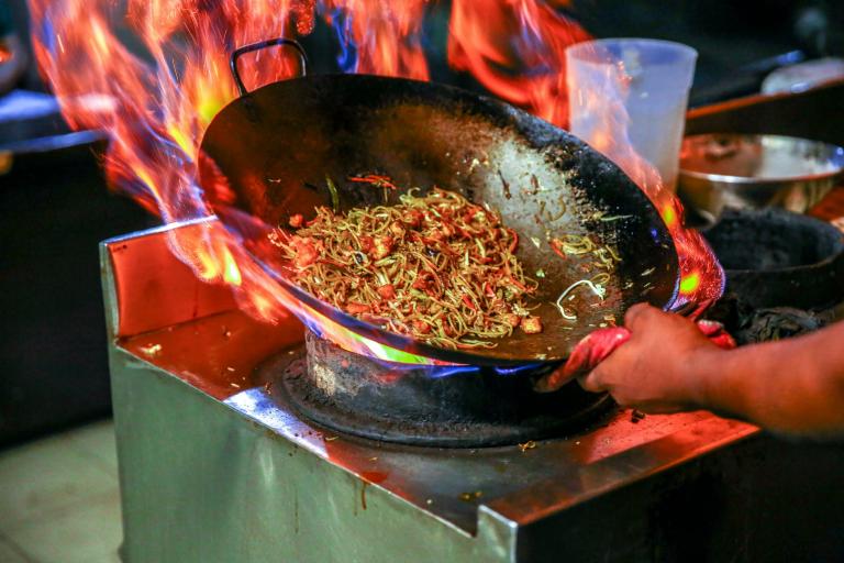 Frying in a wok